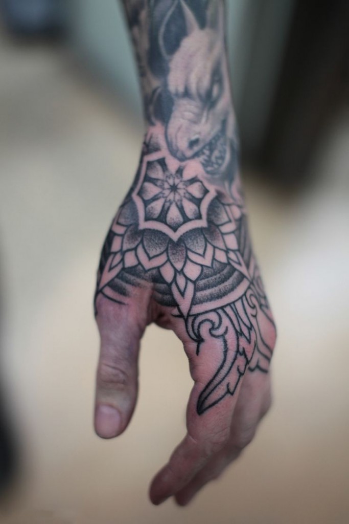 Black Wrist And Hand Tattoo