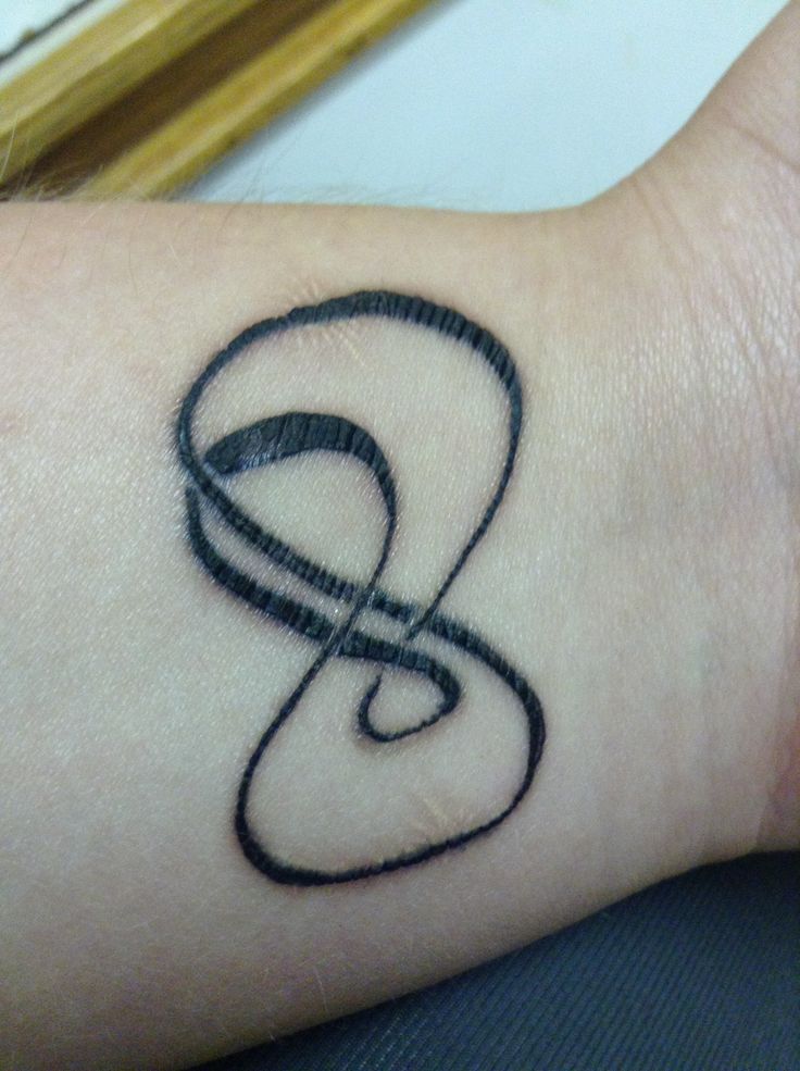 Different double infinity tattoo