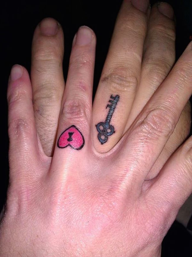 Romantic Wedding Ring finger Tattoo