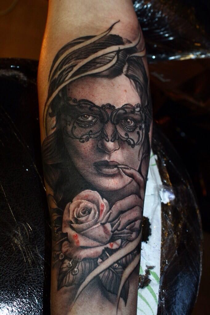 Thinking Girl And Rose Portrait Tattoos On Arm