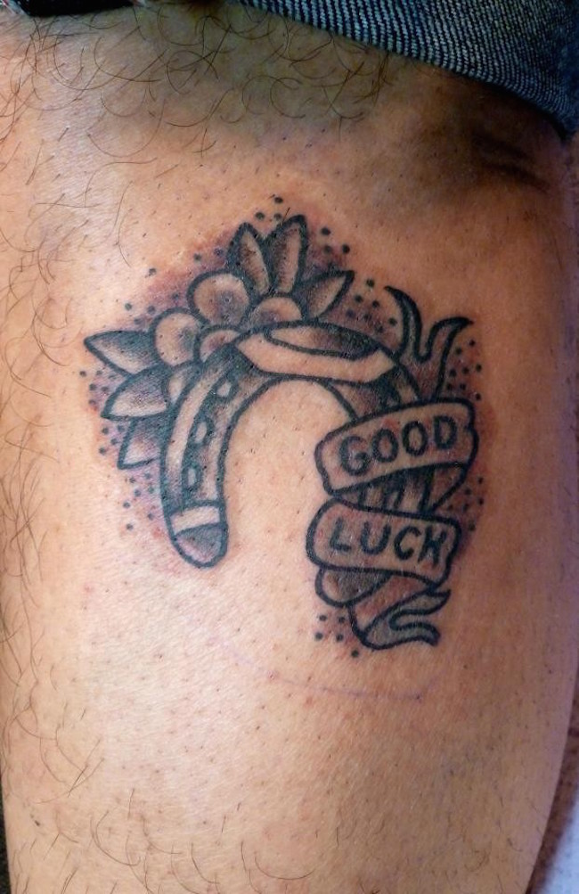 good luck and flowers tattoo