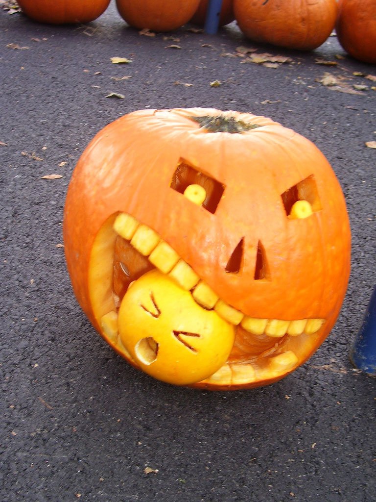 Comfy Halloween Decorating With Small Orange Pumpkin Carving Idea