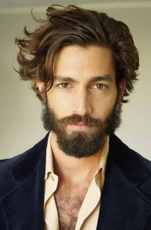 curly hairstyle men with beard